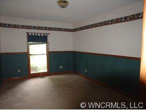 1830 Queentown Road Canton, NC 28716 - Photo 8 of 12 a view of an empty room with a window