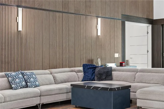 a view of a patio with a table and chairs under an umbrella with a patio