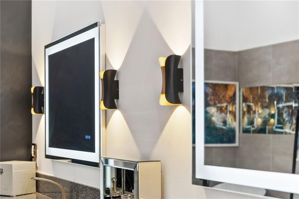 3240 Smithtown Road Suwanee, GA 30024 - Photo 42 of 94 a view of walk in closet with clothes and window