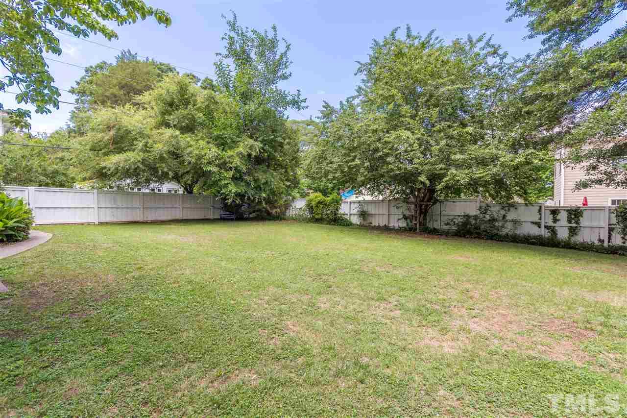 203 Forest Road Raleigh, NC 27605 - Photo 28 of 30 a view of a ocean from a yard