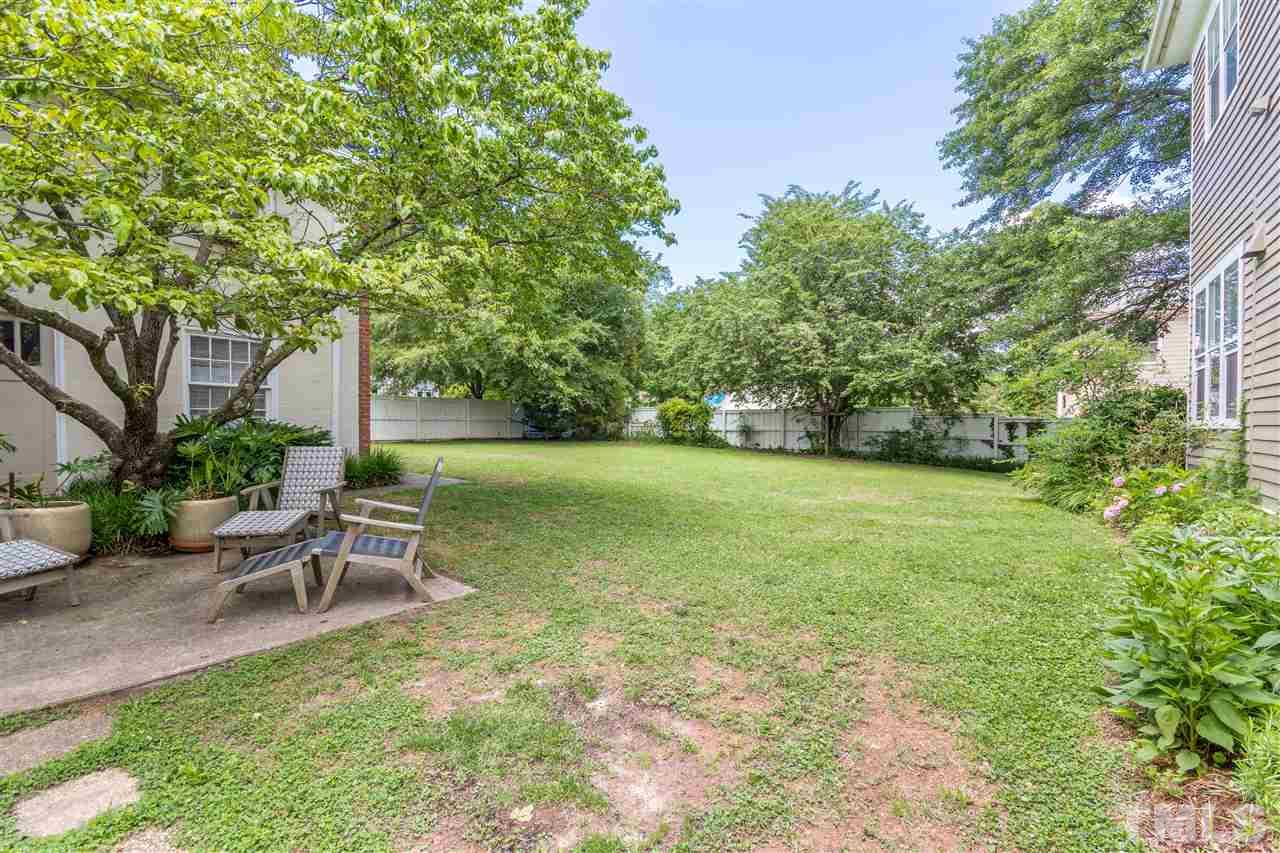 203 Forest Road Raleigh, NC 27605 - Photo 29 of 30 a view of a chair and table on the garden