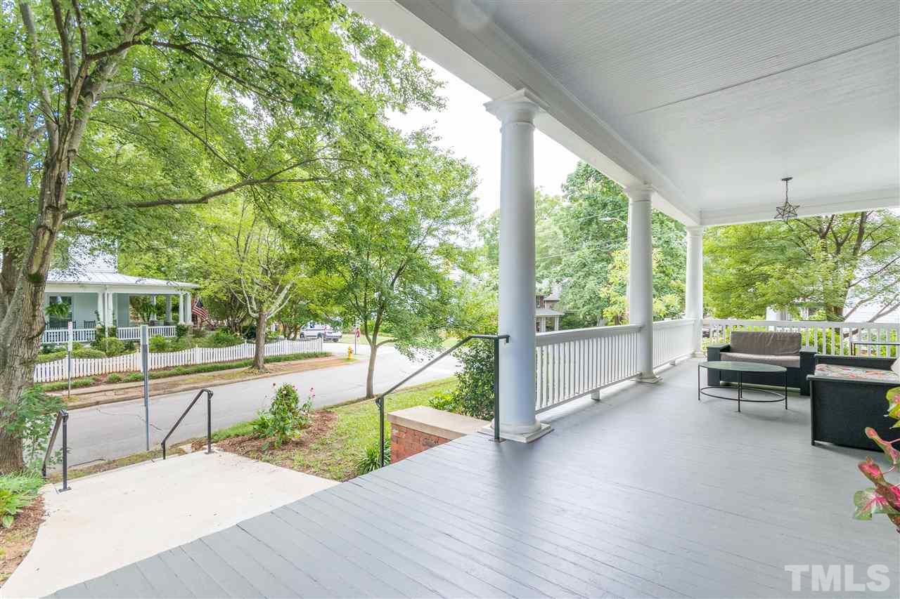 203 Forest Road Raleigh, NC 27605 - Photo 4 of 30 a house view with a sitting space and garden view