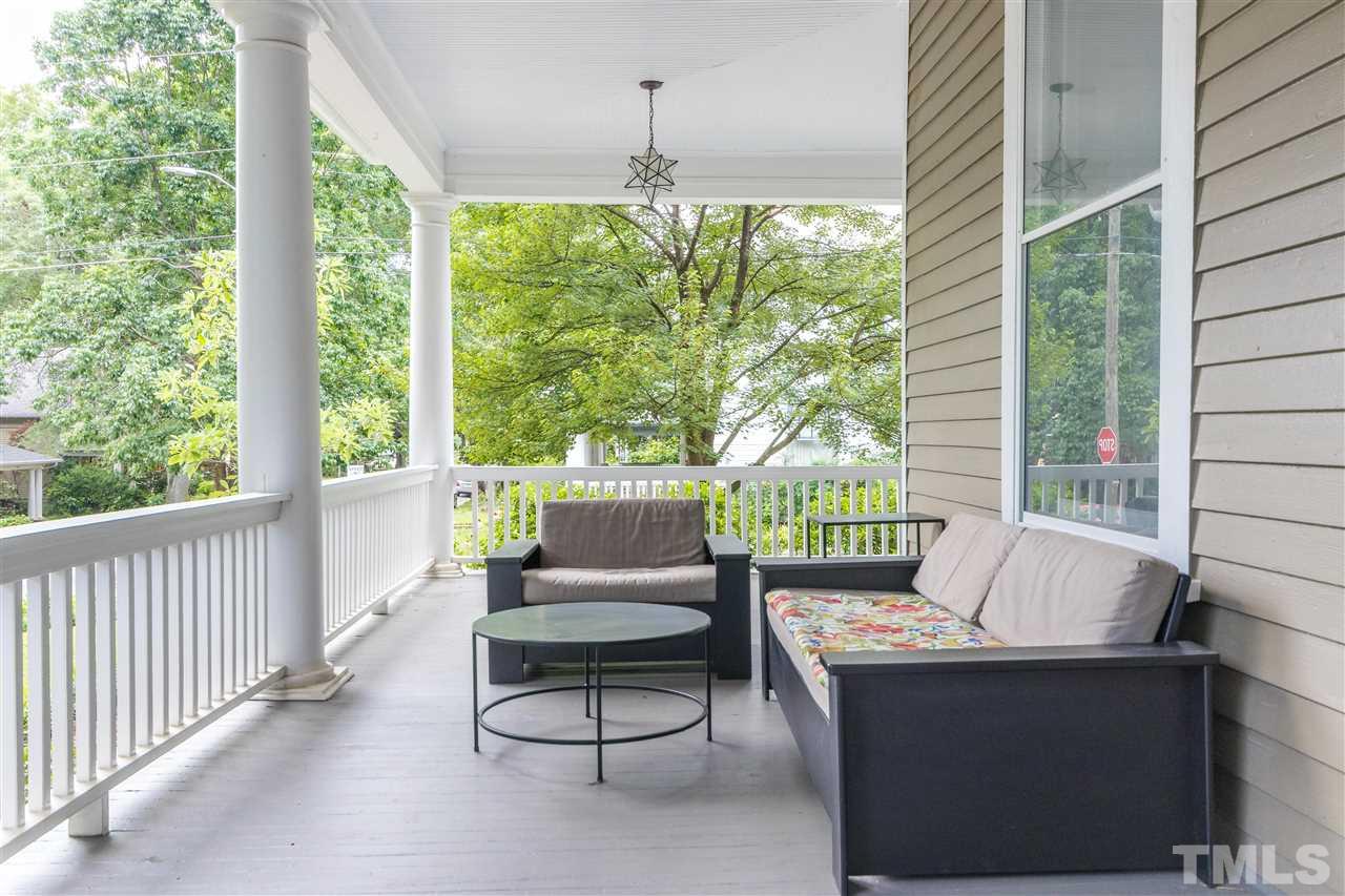 203 Forest Road Raleigh, NC 27605 - Photo 5 of 30 a living room with furniture and a window
