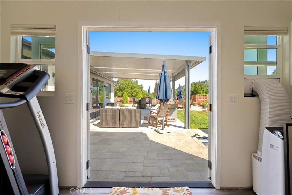 8550 El Corte Road Atascadero, CA 93422 - Photo 55 of 72 a view of a living room and a floor to ceiling window