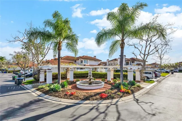 a view of a swimming pool and lounge chairs
