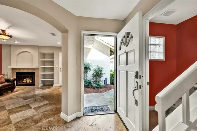 a view of an entryway and fire place