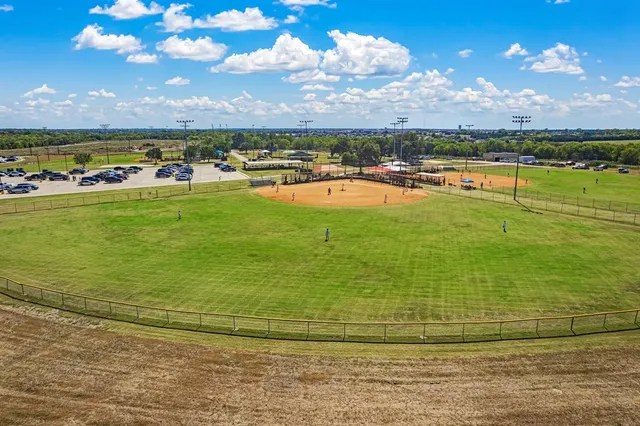 a view of a swimming pool with a lake view