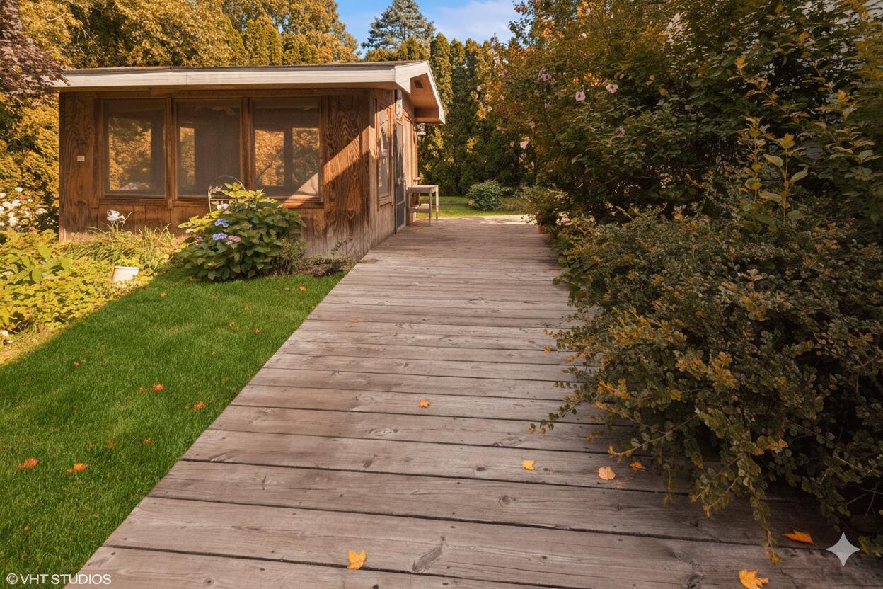 606 South 18th Street Chesterton, IN 46304 - Photo 17 of 24 a front view of a house with trees