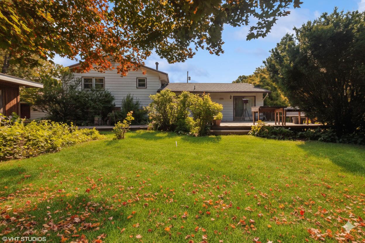 606 South 18th Street Chesterton, IN 46304 - Photo 22 of 24 a front view of a house with a yard