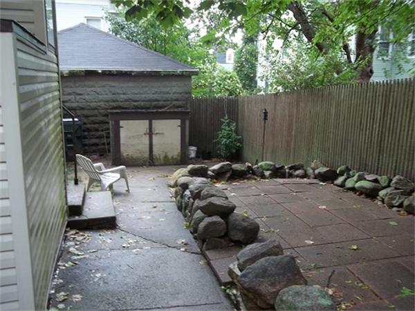 986 Middle Street Fall River, MA 02721 - Photo 3 of 11 a view of a couches and dinning table in patio