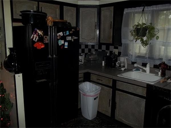 986 Middle Street Fall River, MA 02721 - Photo 6 of 11 a bathroom with a sink and mirror