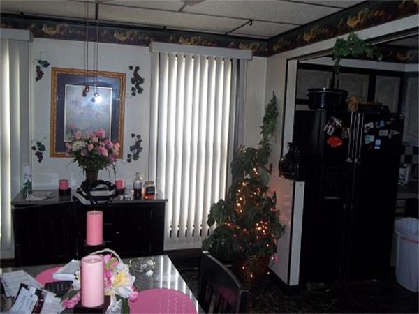 986 Middle Street Fall River, MA 02721 - Photo 7 of 11 a living room filled with furniture and a potted plant