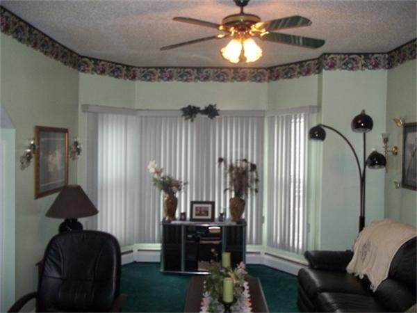 986 Middle Street Fall River, MA 02721 - Photo 9 of 11 a view of a livingroom with furniture and entryway