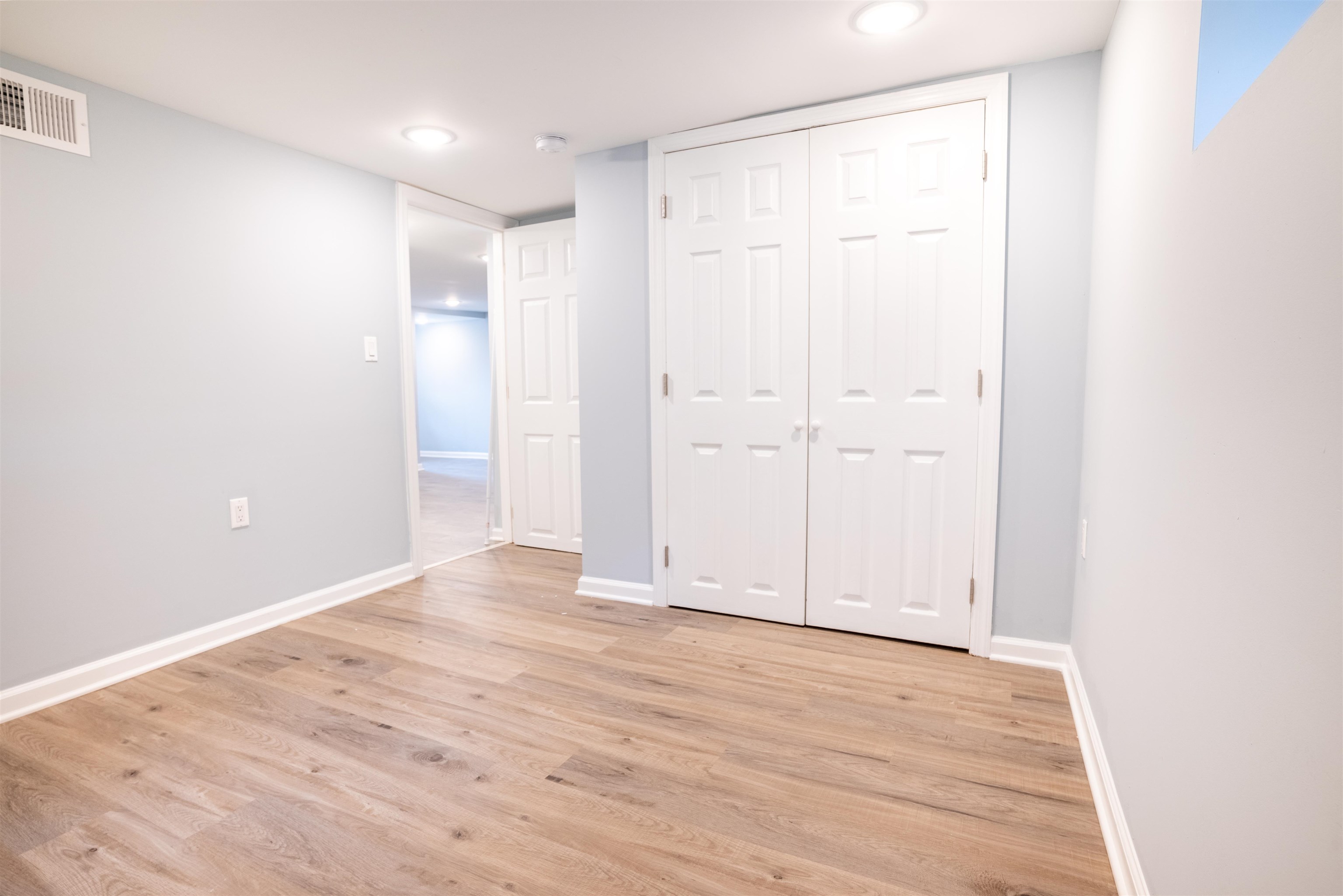 38 Mill Street, Unit 1 Bloomfield, NJ 07003 - Photo 12 of 20 a view of an empty room with wooden floor