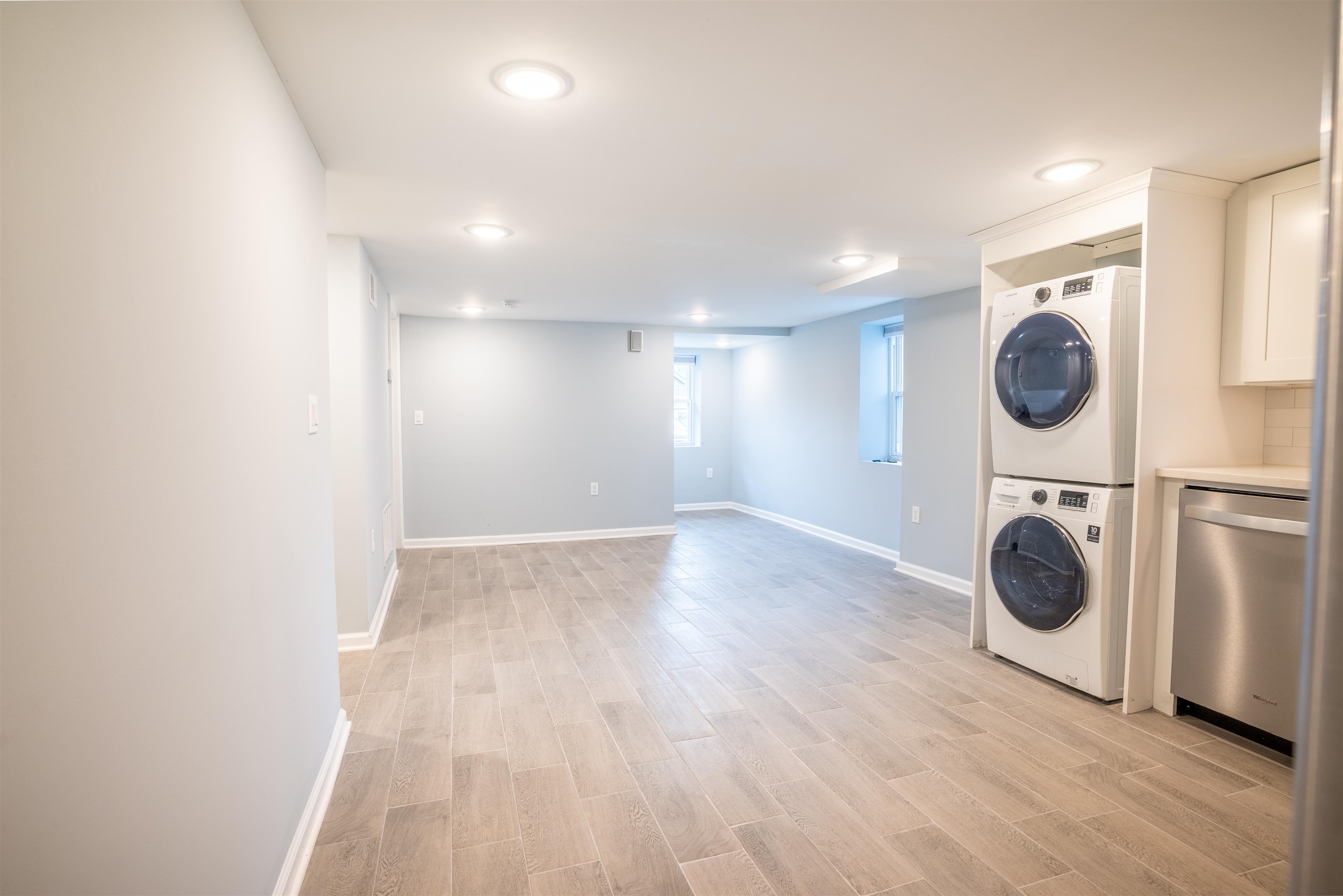 38 Mill Street, Unit 1 Bloomfield, NJ 07003 - Photo 7 of 20 a view of an empty room with wooden floor and a window