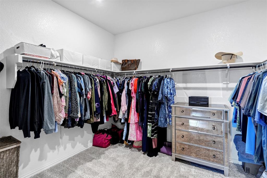 10616 Brookshire Road Fort Worth, TX 76126 - Photo 15 of 29 Massive walkin closet in the primary bedroom