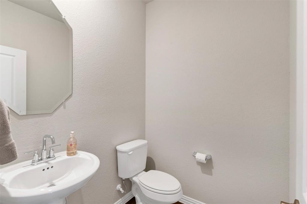 10616 Brookshire Road Fort Worth, TX 76126 - Photo 18 of 29 Half bath right off the living room - perfect for guests