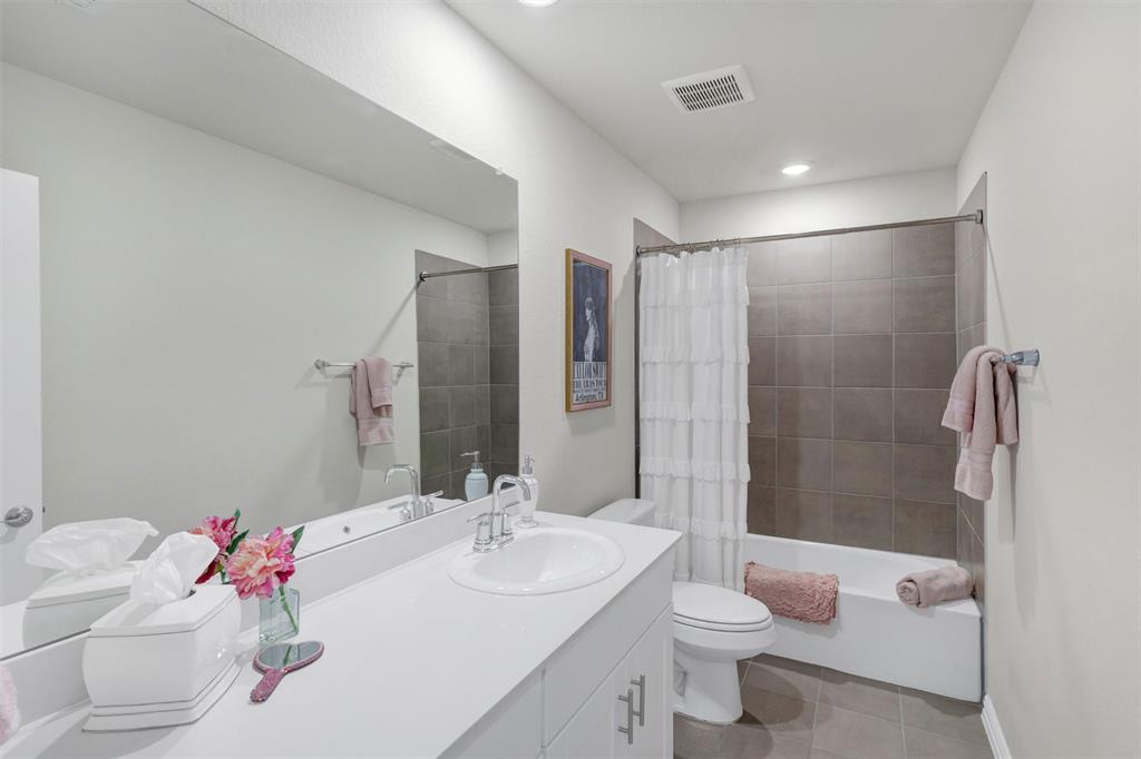 10616 Brookshire Road Fort Worth, TX 76126 - Photo 21 of 29 Large upstairs hall bathroom with a ton of counter space and storage