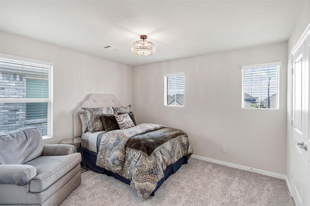 10616 Brookshire Road Fort Worth, TX 76126 - Photo 23 of 29 One of the 3 upstairs bedroom - this one has a separate, private full bathroom attached
