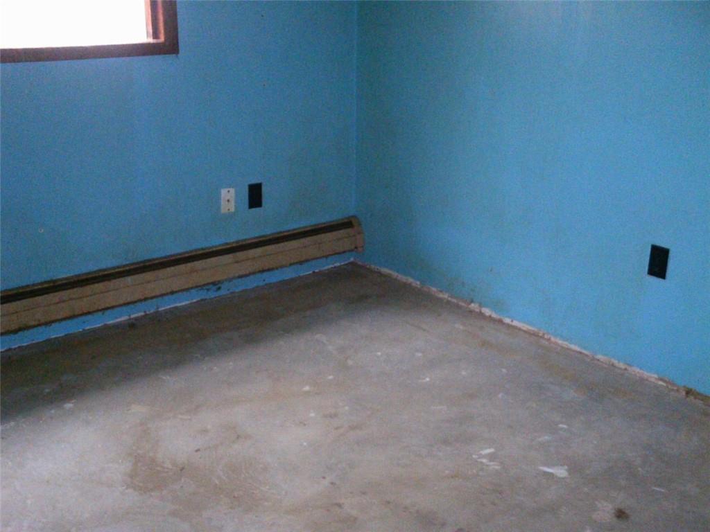 494 Gilmore Road New Castle, PA 16102 - Photo 5 of 7 a room with a bench