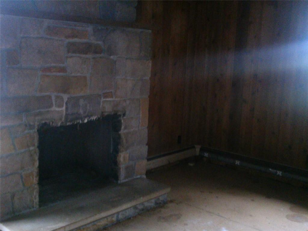 494 Gilmore Road New Castle, PA 16102 - Photo 6 of 7 a empty room with a wooden door