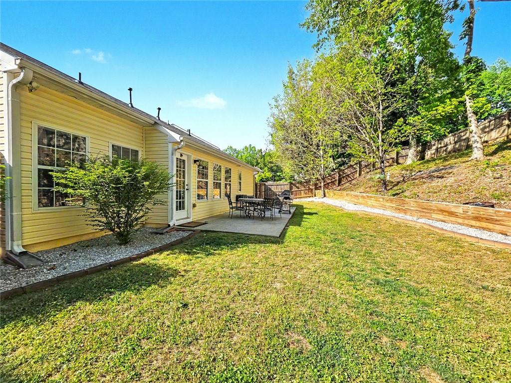 209 Diamond Valley Pass Canton, GA 30114 - Photo 26 of 27 a house view with swimming pool in front of it