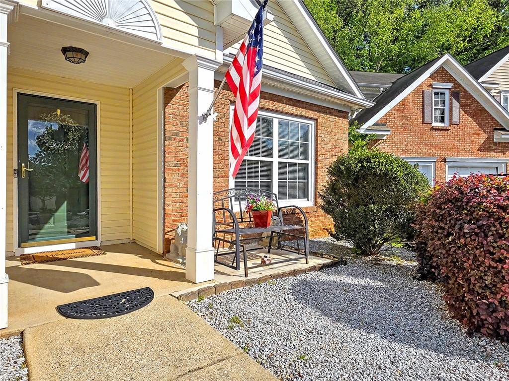 209 Diamond Valley Pass Canton, GA 30114 - Photo 3 of 27 a house view with a outdoor space