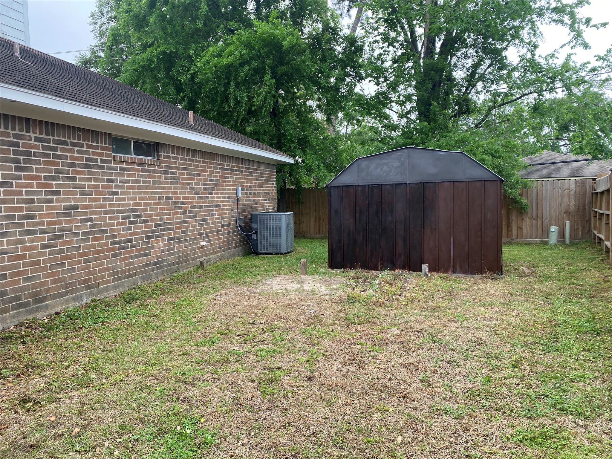 3601 Colleen Meadows Circle Houston, TX 77080 - Photo 13 of 22 North Side Yard Showing Shed