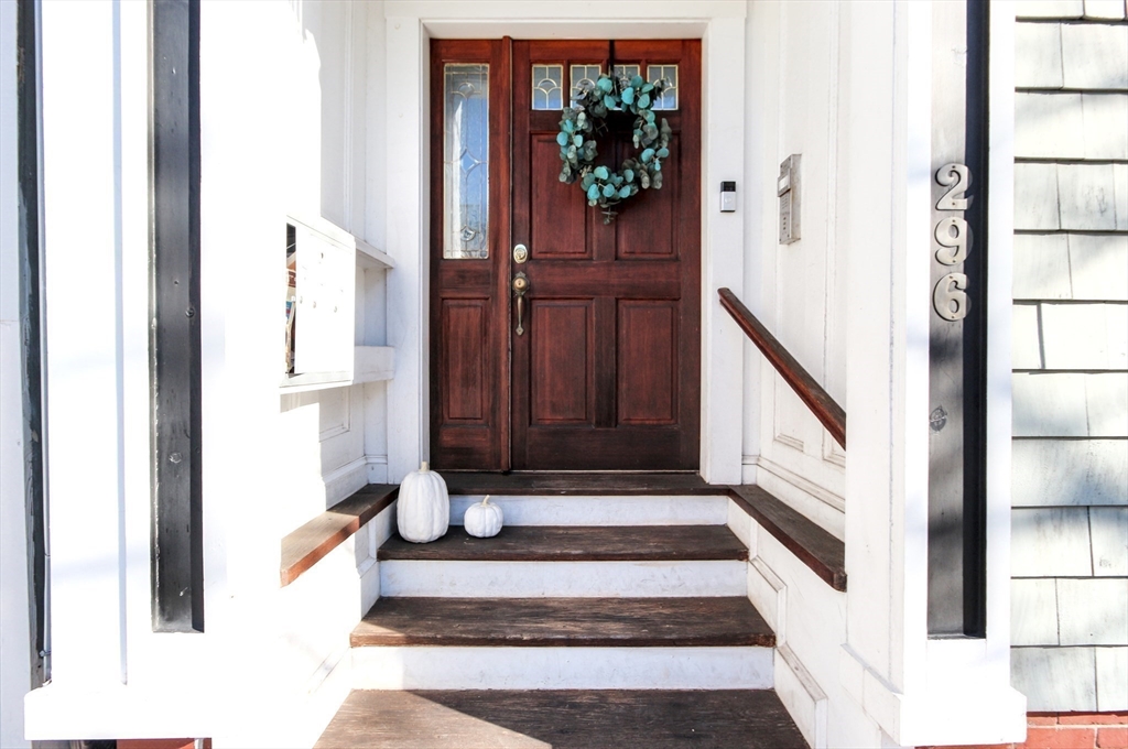 296 West 3rd Street, Unit U1 Boston, MA 02127 - Photo 15 of 22 a view of a hallway with wooden floor and staircase