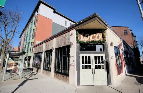 a view of a building with a porch
