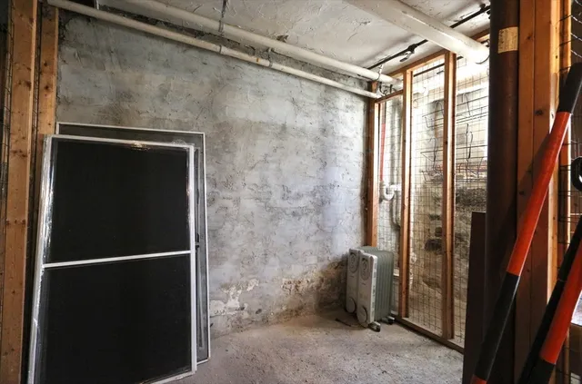 a bathroom with a glass shower door