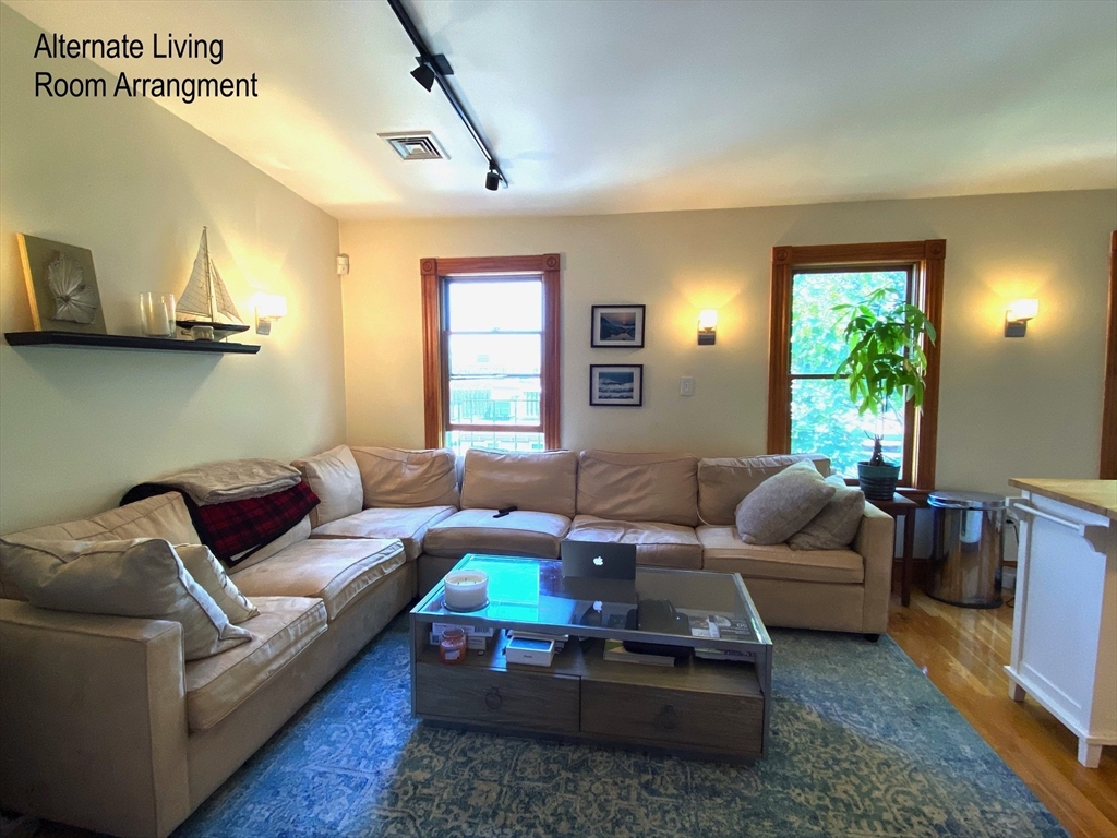 296 West 3rd Street, Unit U1 Boston, MA 02127 - Photo 7 of 22 a living room with furniture and a window