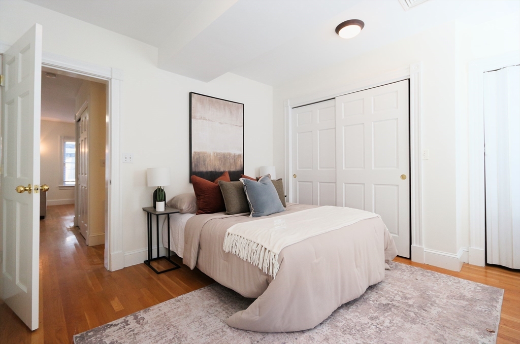 296 West 3rd Street, Unit U1 Boston, MA 02127 - Photo 9 of 22 a bedroom with a bed and a table