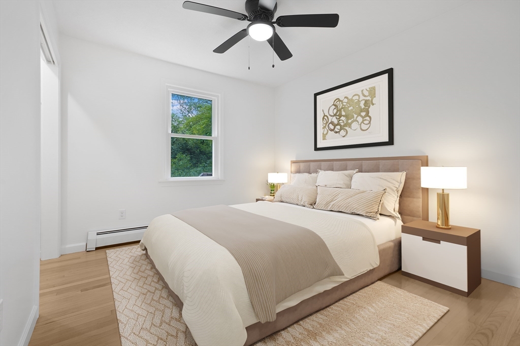 90 Merlin Drive Swansea, MA 02777 - Photo 7 of 13 a bedroom with a bed and a window