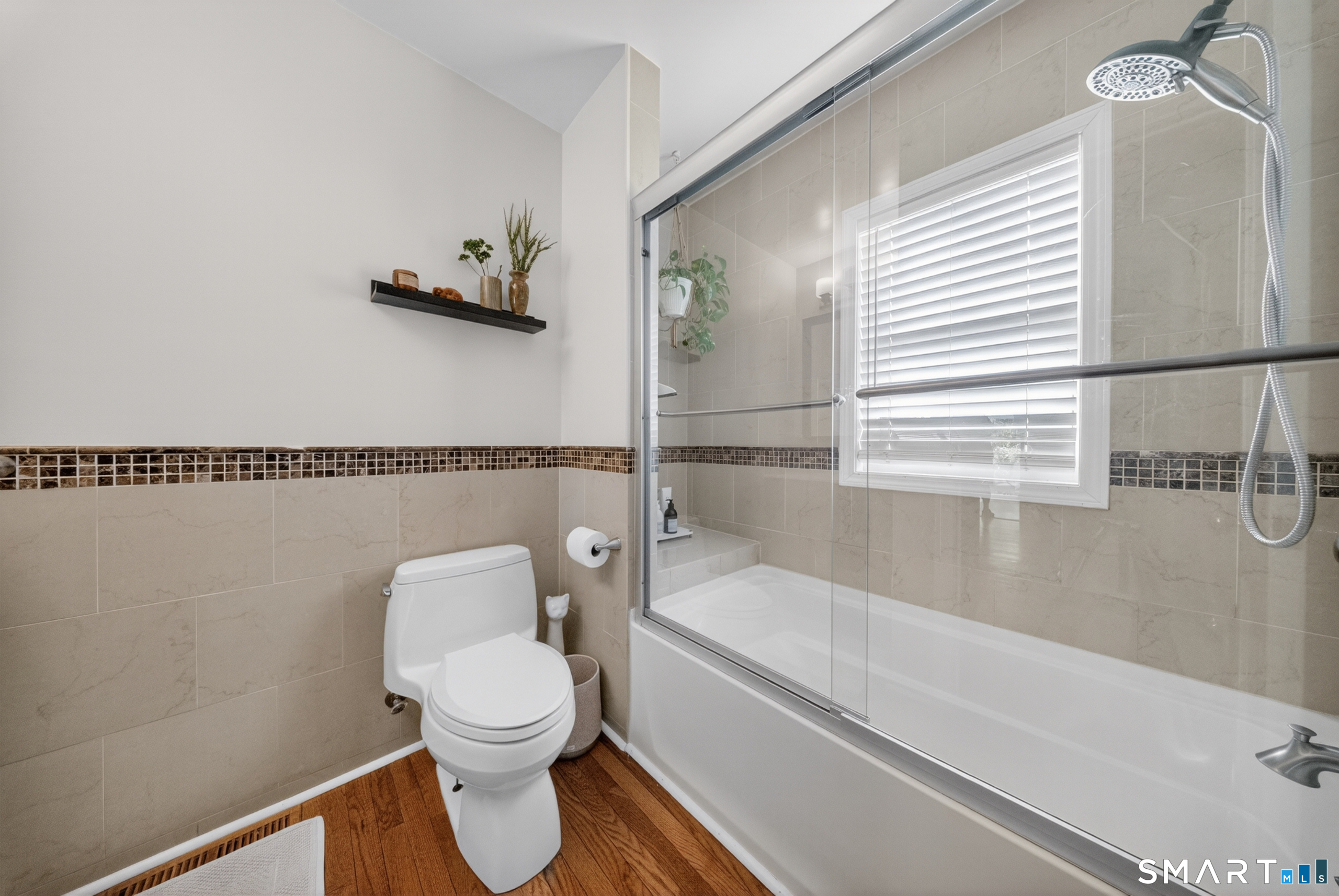 68 Old Elm Road Fairfield, CT 06825 - Photo 11 of 40 a bathroom with a toilet and a bathtub