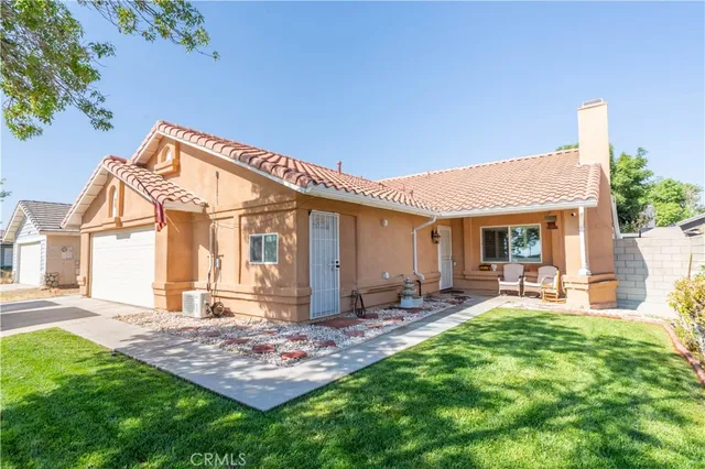 a front view of a house with patio