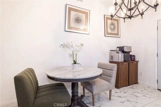 a view of a dining room with furniture