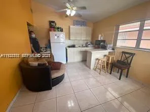 a kitchen with a cabinets and appliances