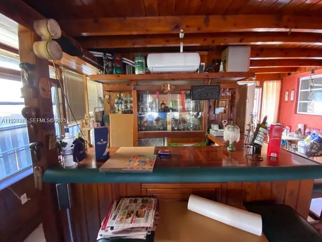 a room with lots of wooden furniture