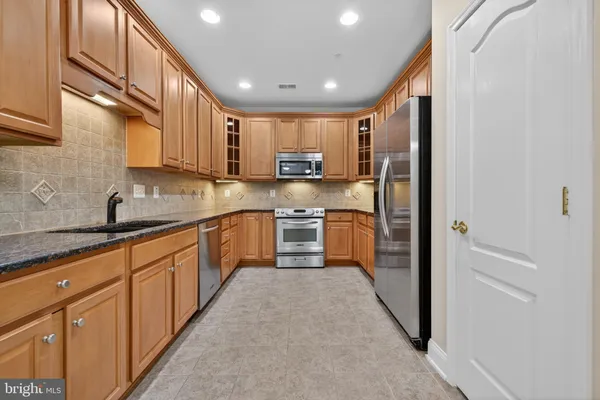 $545,000 | 327 King Farm Boulevard, Unit 203, Rockville, MD 20850