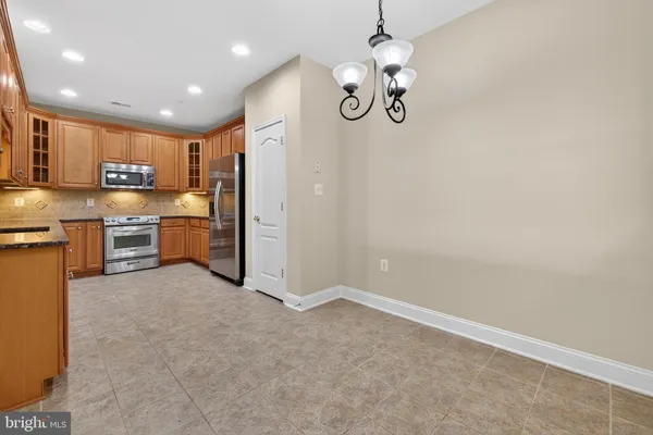 $545,000 | 327 King Farm Boulevard, Unit 203, Rockville, MD 20850