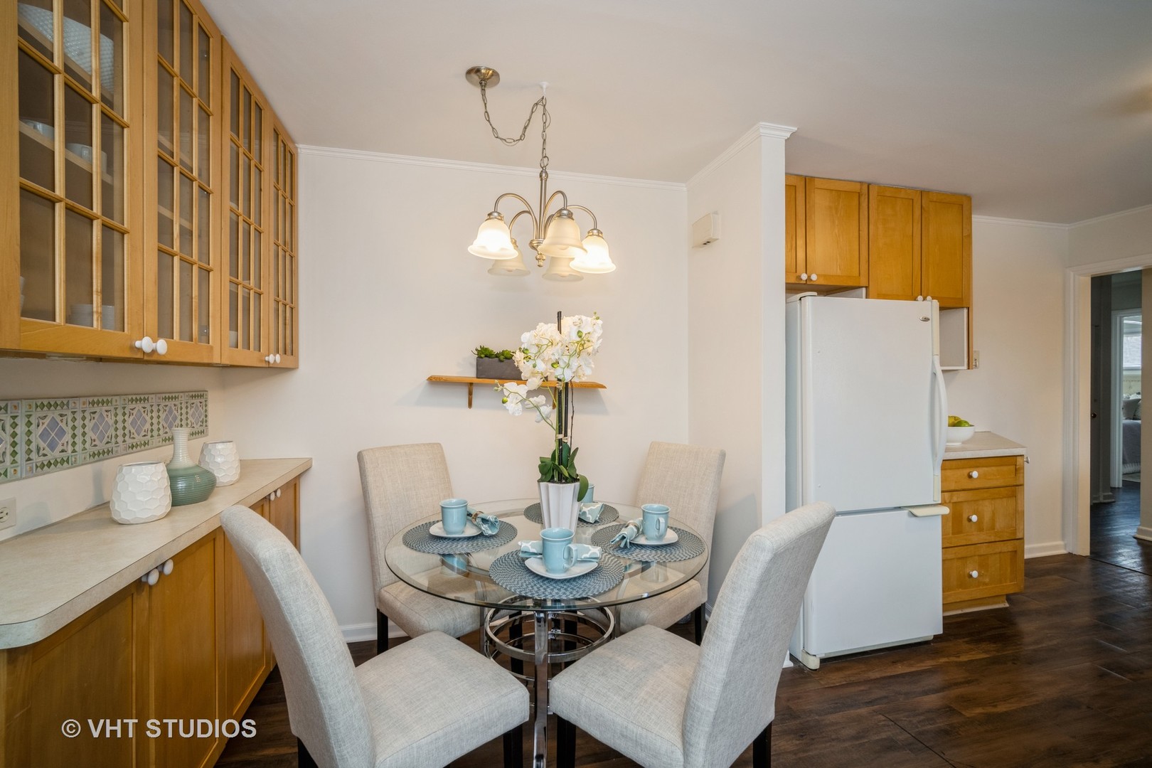 1137 Midway Road Northbrook, IL 60062 - Photo 12 of 18 a view of a dining room with furniture and wooden floor