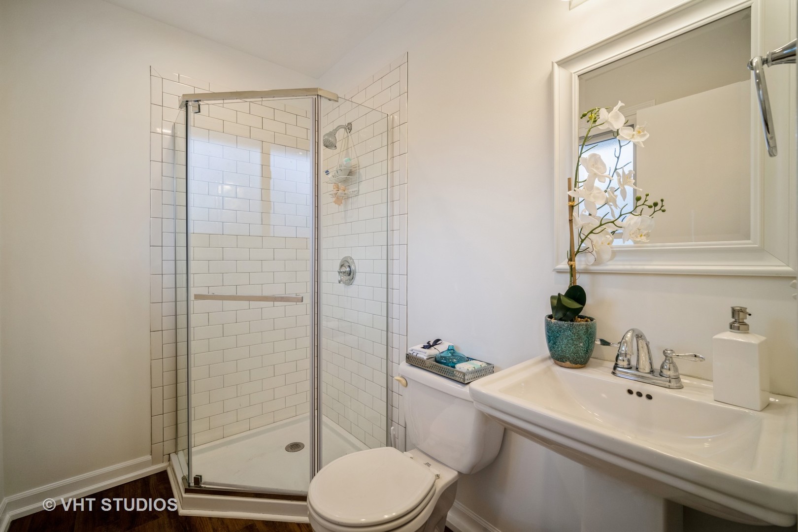 1137 Midway Road Northbrook, IL 60062 - Photo 16 of 18 a bathroom with a sink toilet and shower