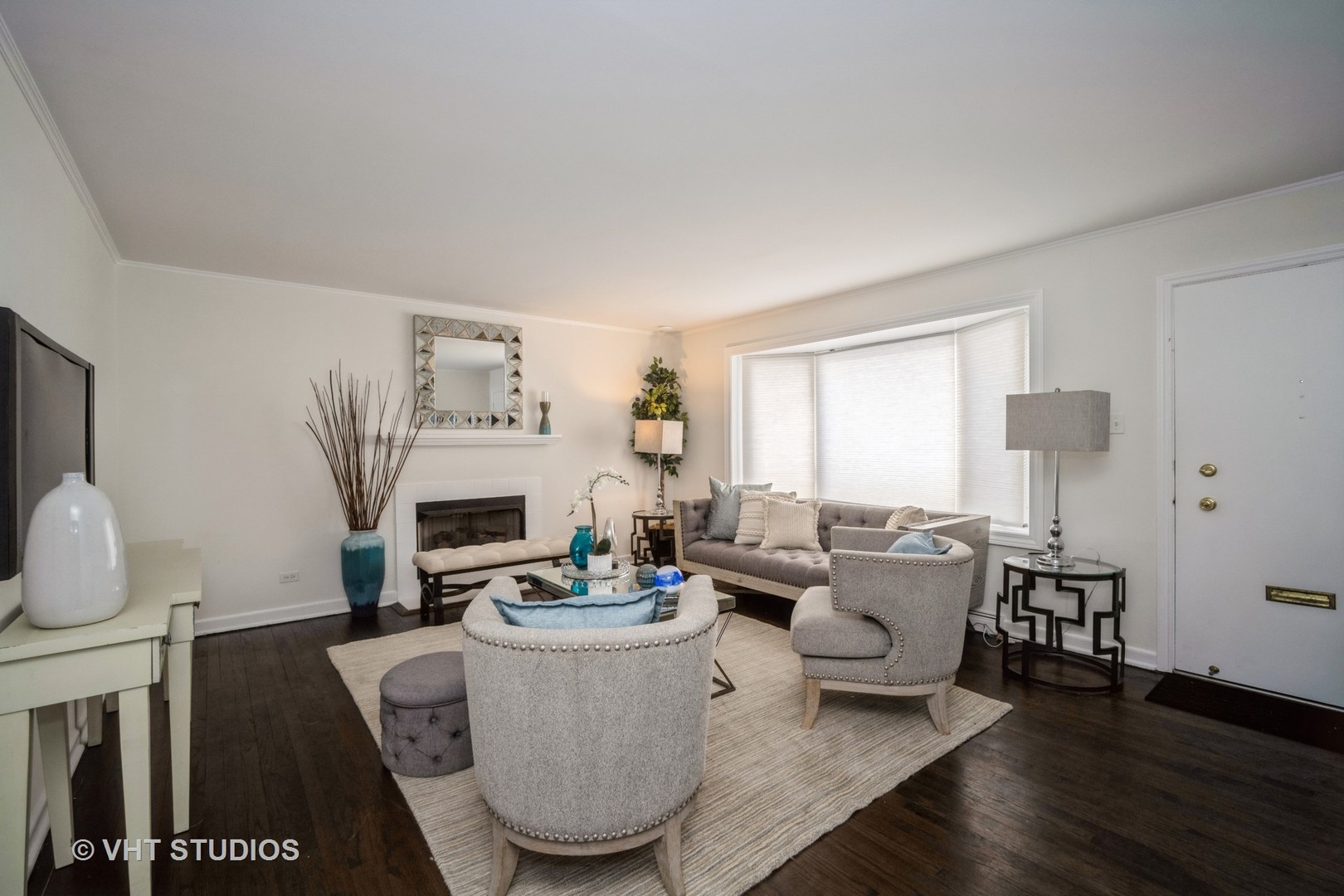 1137 Midway Road Northbrook, IL 60062 - Photo 3 of 18 a living room with fireplace furniture and a wooden floor