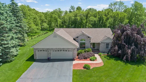 $430,000 | 5800 Jeanne Marie Drive, White Lake, MI 48383