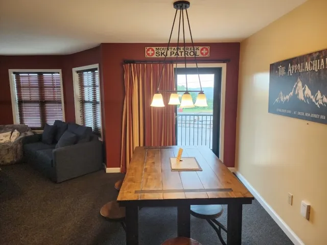 a bedroom with bed and window