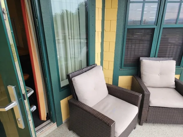 a kitchen with sink cabinets and microwave