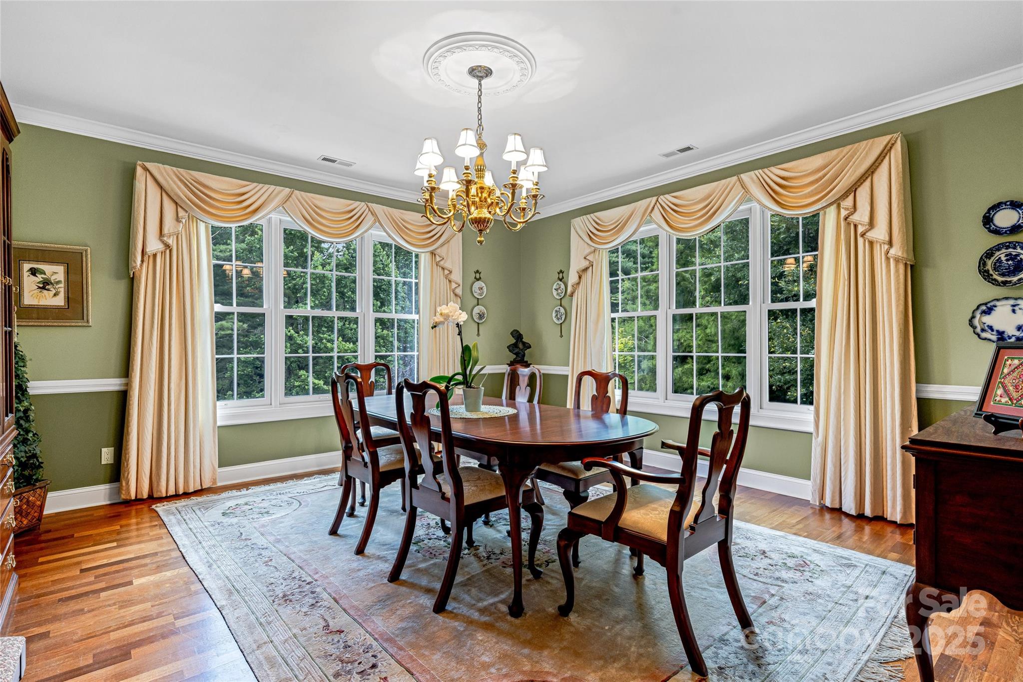 842 Rickel Drive Hendersonville, NC 28739 - Photo 15 of 48 a view of a dining room with furniture window and wooden floor