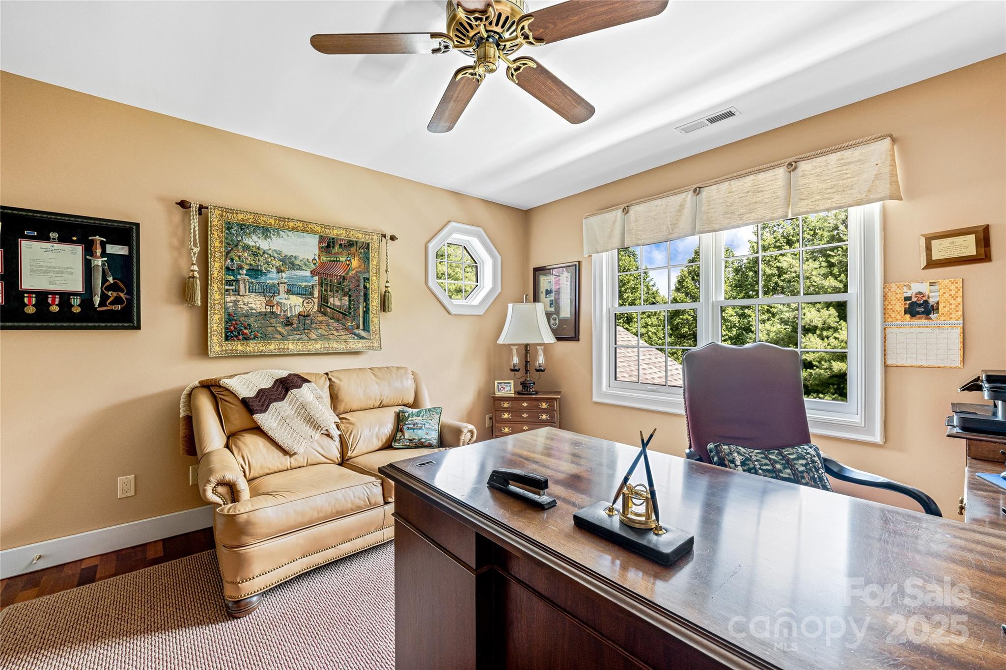 842 Rickel Drive Hendersonville, NC 28739 - Photo 26 of 48 a living room with furniture and a large window