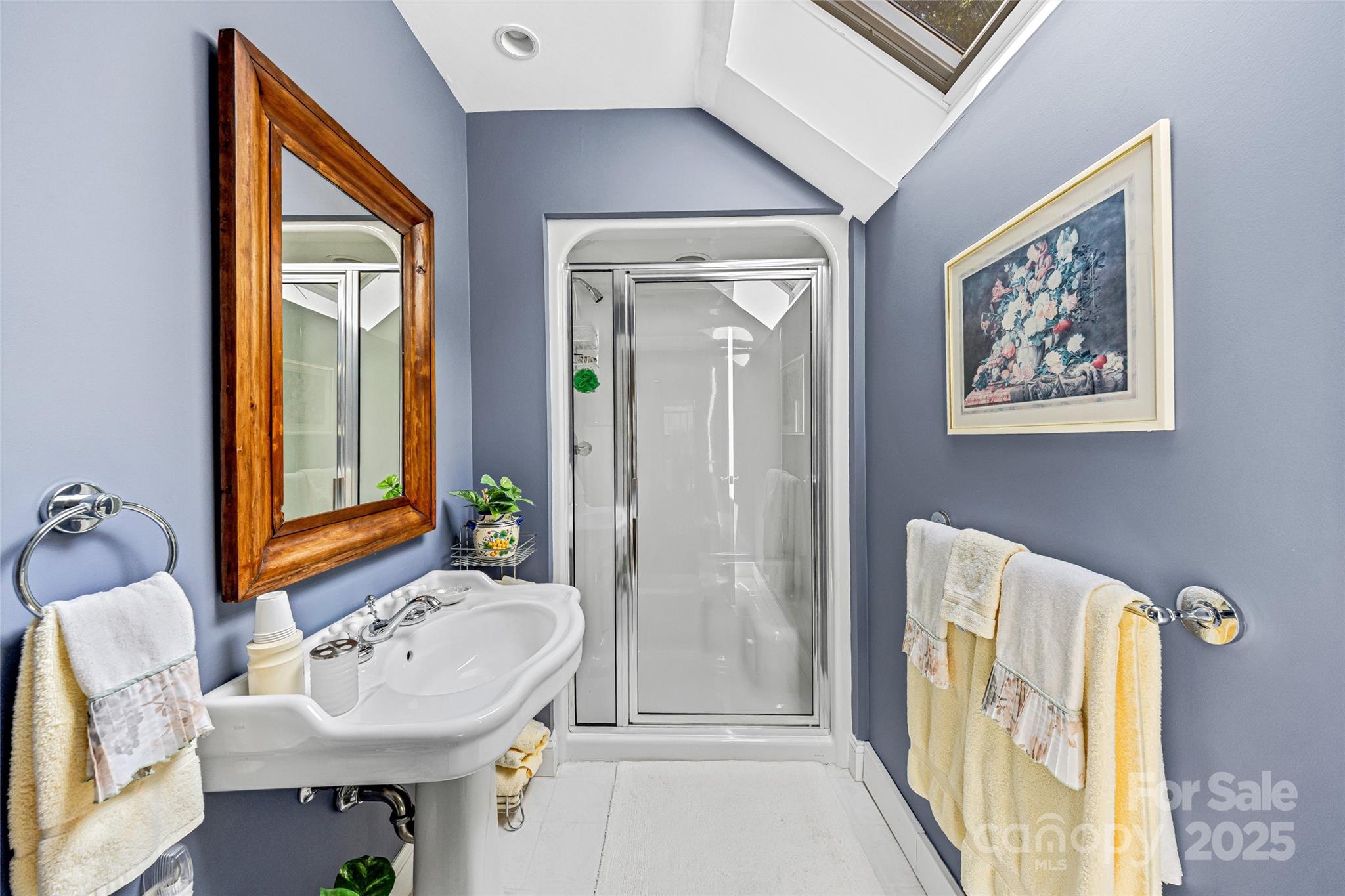 842 Rickel Drive Hendersonville, NC 28739 - Photo 29 of 48 a bathroom with a sink and a mirror